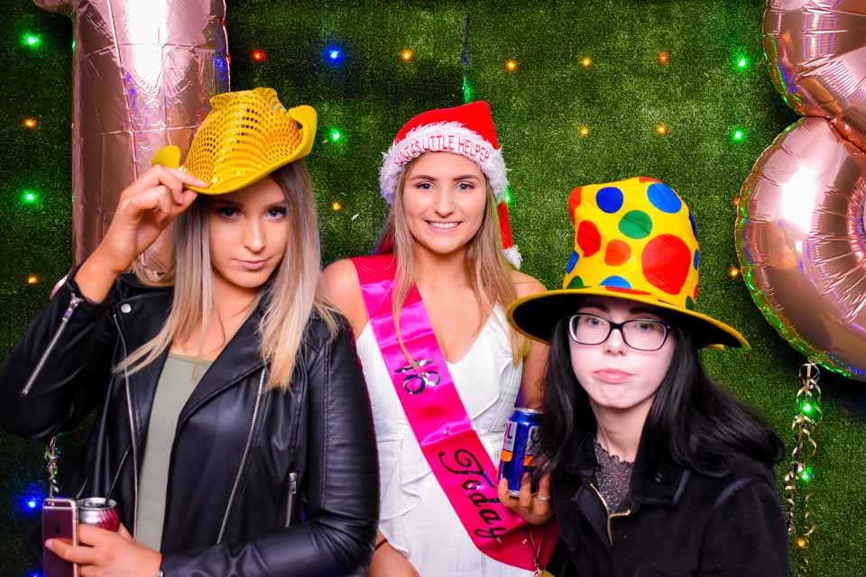 Fake grass outdoor photo booth wall